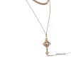 3884-layered-gold-tone-cross-pendant-necklace-2.webp Layered Gold-Tone Cross Pendant Necklace